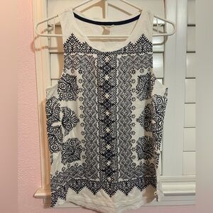 Lucky Brand white Tank Top with blue floral pattern on the front.